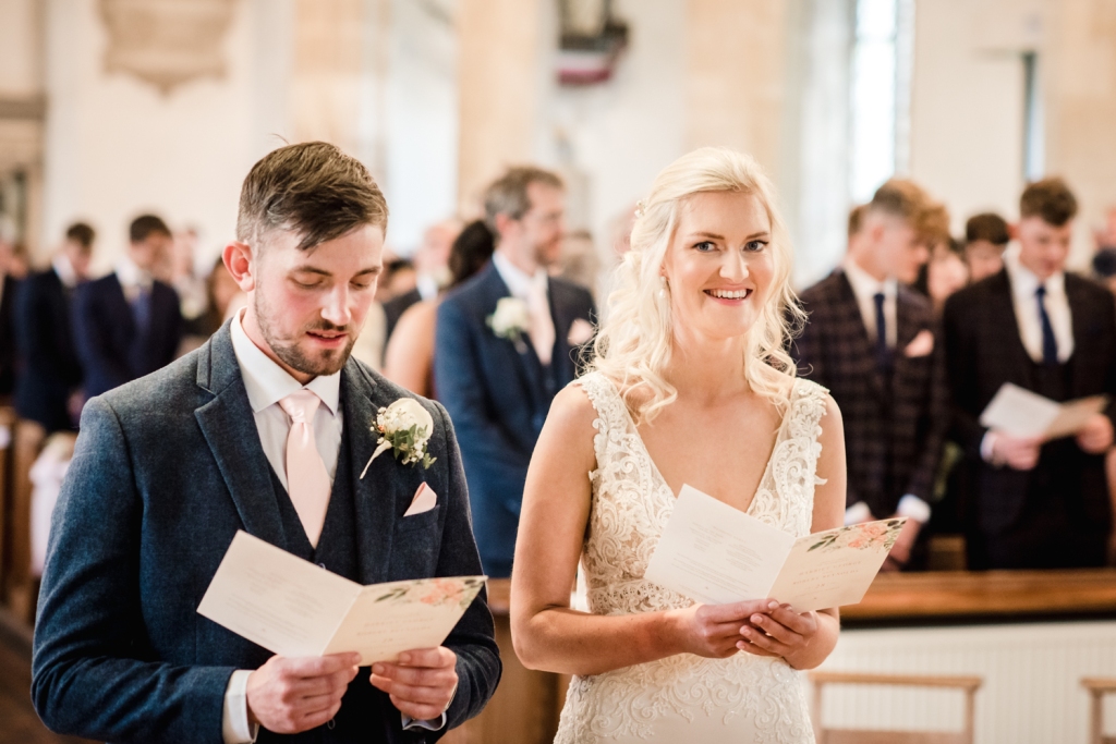 bride and groom st marys church painswick gloucestershire