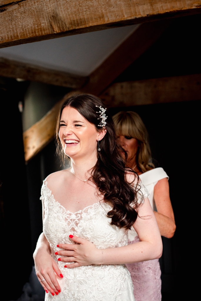 bride dress buttoned cotswold wedding